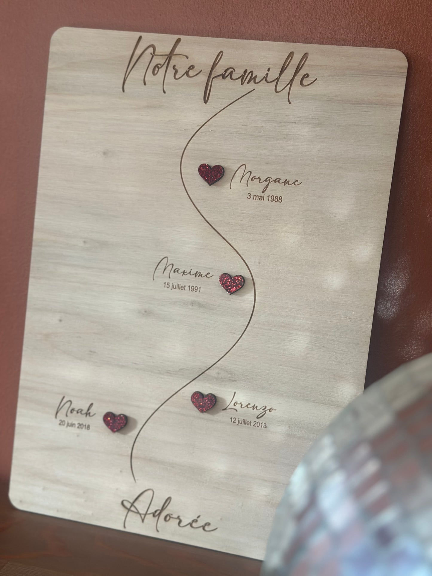 Affiche en bois "Notre famille adorée"
